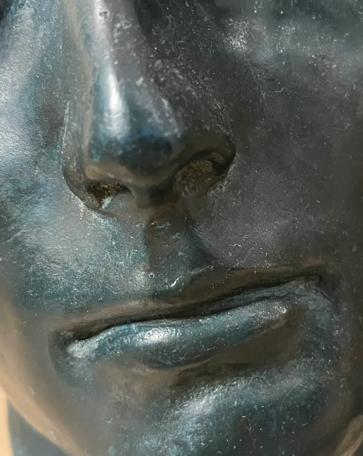 Centurione I — face detail, dark patina — Igor Mitoraj