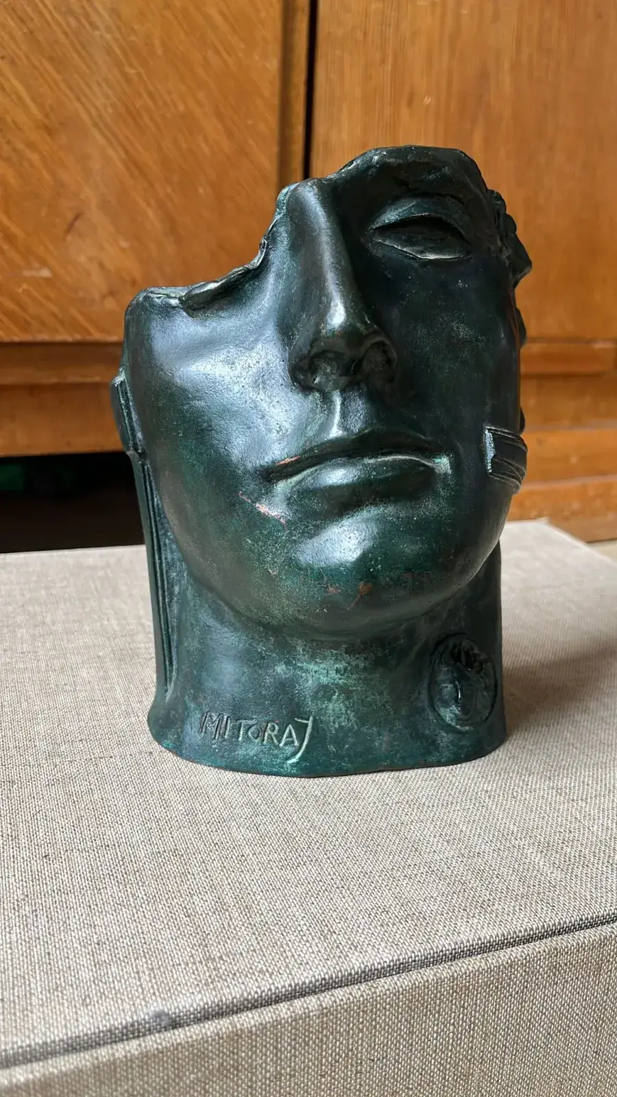 Centurione II (1987) — Igor Mitoraj, green patina bronze head, edition of 1500, signed