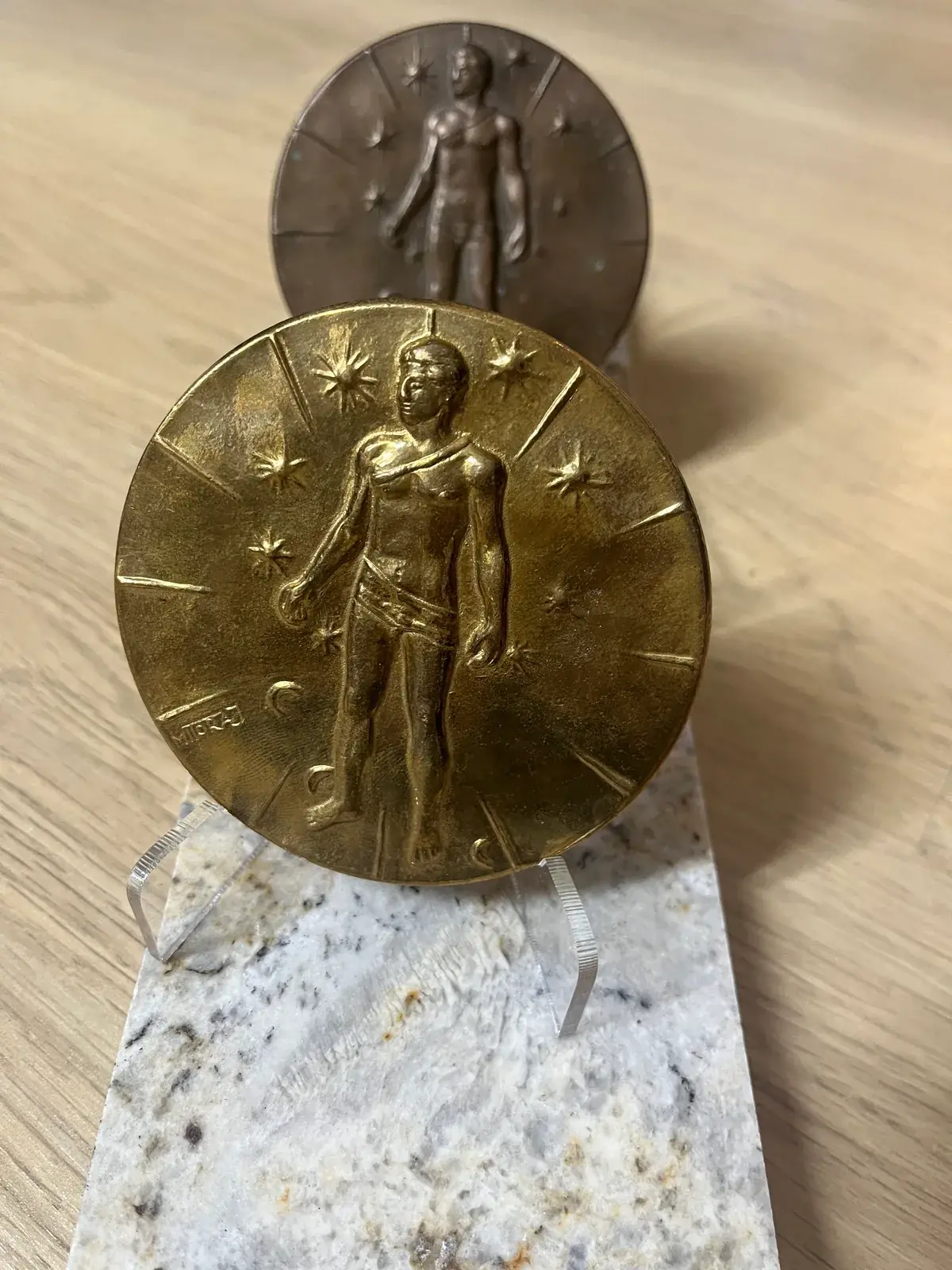 Artcurial Mitoraj medals — gilt in focus