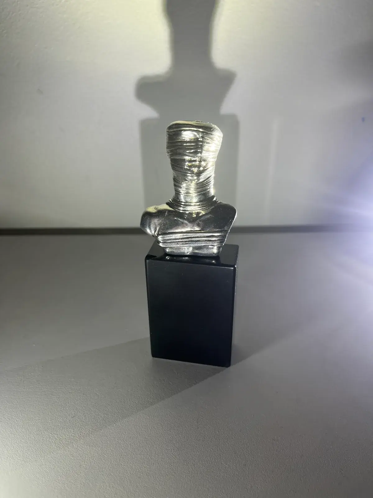 Petit Prométhée Argent ed. 5/8 — front view on plinth, Igor Mitoraj, Artcurial 1981