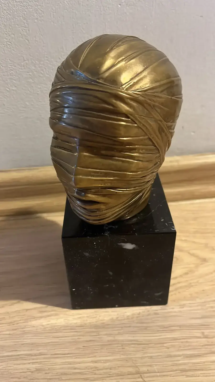 Tête Secrète (1978) — Igor Mitoraj, gold patina bronze head, limited edition, private collection
